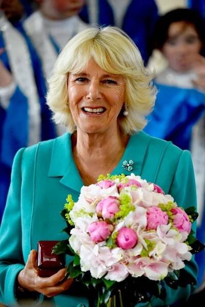 The Duchess of Cornwall met with students before taking part in the Suas literacy support programme  during her visit to the Claddagh National School in Galway on the first day of her Royal visit to the Republic of Ireland. PRESS ASSOCIATION Photo. Picture date: Tuesday May 19, 2015. See PA story ROYAL Ireland. Photo credit should read: Jeff J Mitchell/PA Wire