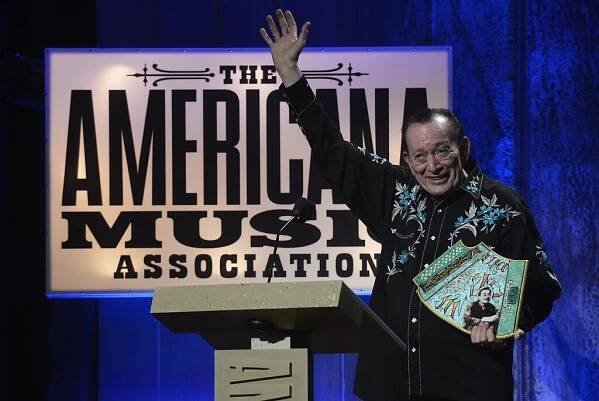 FILE - Flaco Jimenez accepts the Lifetime Achievement for Instrumentalist Award during the Americana Music Honors and Awards show Wednesday, Sept. 17, 2014, in Nashville, Tenn. (AP Photo/Mark Zaleski, File)