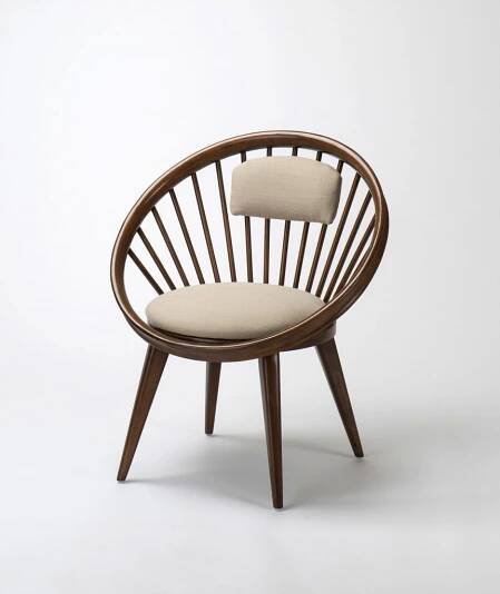 a contemporary chair on white seamless