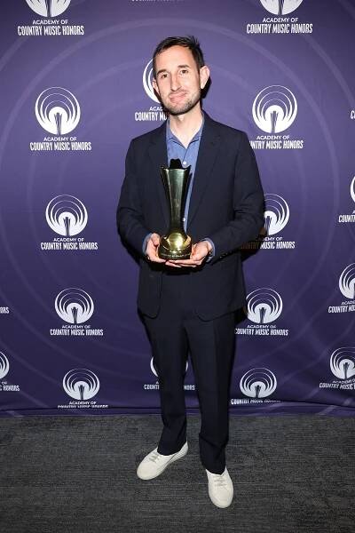 NASHVILLE, TENNESSEE - AUGUST 20: Brandon Davis of "Twisters" poses with the ACM Film Award during the 18th Academy Of Country Music Honors at The Pinnacle on August 20, 2025 in Nashville, Tennessee. (Photo by Terry Wyatt/Getty Images for ACM)
