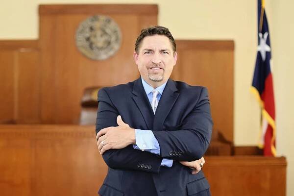 Attorney Justin K. Hall Crossing his Arms