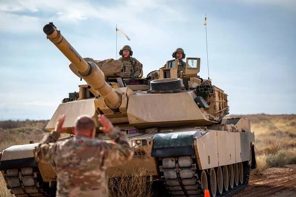 C-130 Simulates Refueling M1 Abrams Tank During Exercise