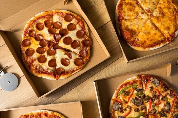 Score a Slice With These National Pizza Day Deals & Super Bowl Specials!