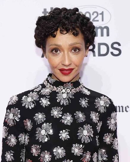 Ruth Negga with long curly pixie 