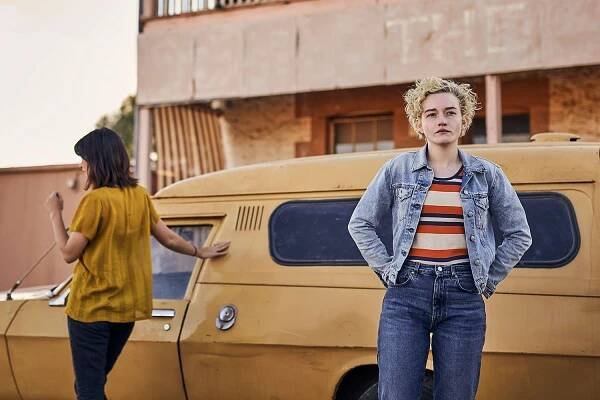 Julia Garner and Jessica Henwick Are Trapped in a Terrifying Situation in 'The Royal Hotel' Trailer