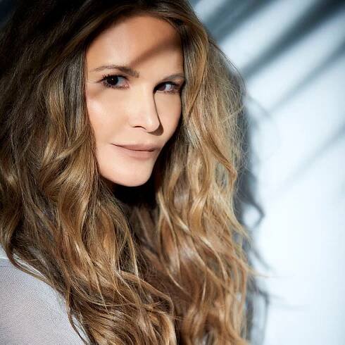 EXCLUSIVE: Everything Elle Macpherson packs for the holidays, from her bikinis to beauty minis