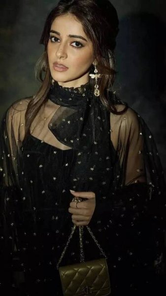 Ananya Panday brings style statement to remember in chic black net cape dress