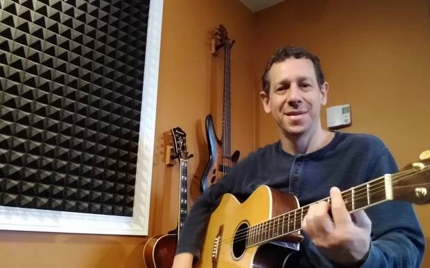 Andrew Wright in his studio for Guitar Lessons and Bass Lessons