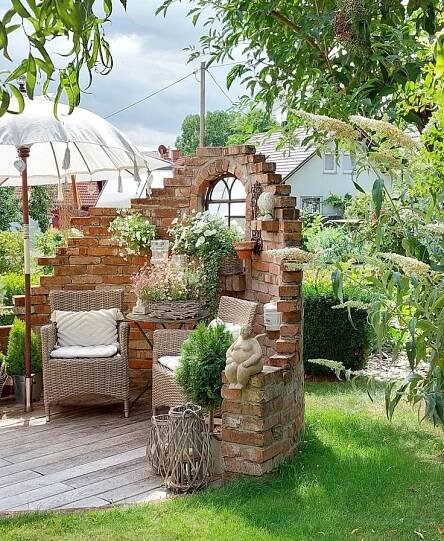 an outdoor patio with chairs and umbrellas