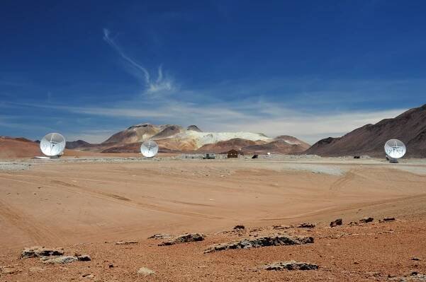 Closing the Loop for ALMA - Three antennas working in unison open new bright year for revolutionary observatory
