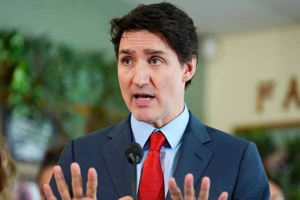 Canadian Prime Minister Justin Trudeau answers reporters questions during an event in Ottawa
