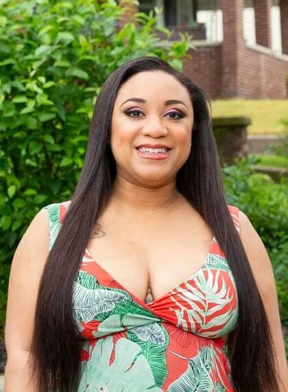 Memphis Smith from 90 Day Fiancé: Before the 90 Days in a low cut floral dress.