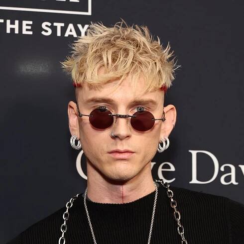 Machine Gun Kelly shocks fans with massive black upper body tattoo