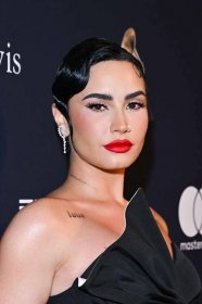 Demi Lovato in sleek stylized bixie attends the Pre-GRAMMY Gala & GRAMMY Salute to Industry Icons Honoring Julie Greenwald and Craig Kallman