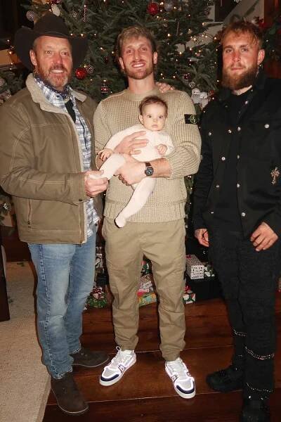 Logan Paul celebrates the holidays with daughter Esmé, brother Jake Paul and father Greg Paul.