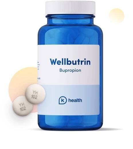 Bottle of Wellbutrin with two pills beside it