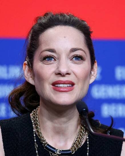 Marion Cotillard likens public image to Berlinale fairy tale film's cursed camera effect