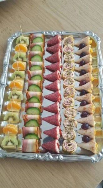 an assortment of finger foods on a tray