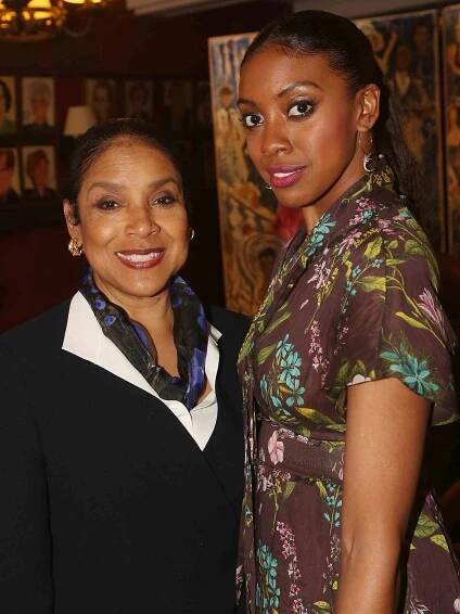 Phylicia Rashad and daughter Condola Rashad pose as Condola Rashad recieves her caricature for her role in the MTC play "St. Joan" on May 10, 2018 in New York City. 