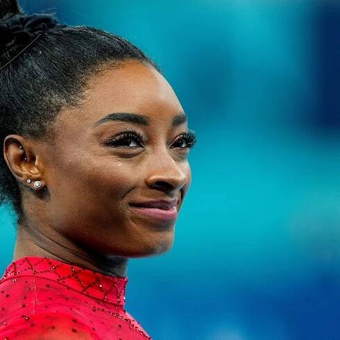 Simone Biles' living room is a cozy and refined space — design experts say it's a masterclass in...