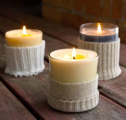 candles with sweaters