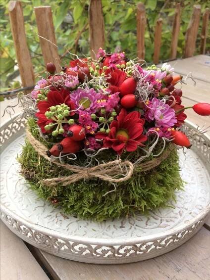 Christmas Floral Arrangement on White Plate