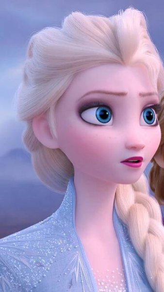an image of a frozen princess with blue eyes and blonde hair looking into the distance
