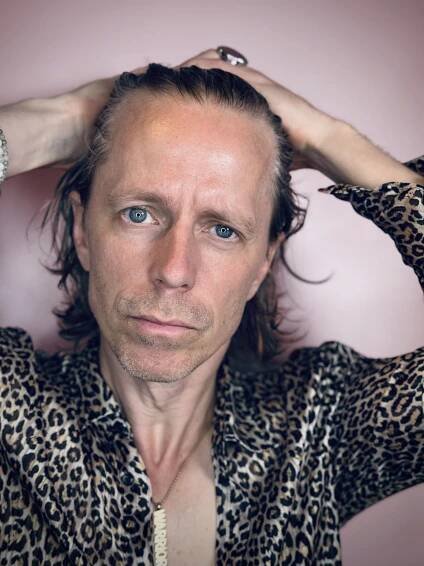 Professional headshot of Swedish actor Fredrik Wagner