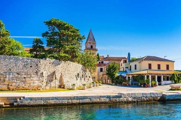 The town of Osor, on the channel that separates Cres and Losinj, one of the best places to visit in Croatia