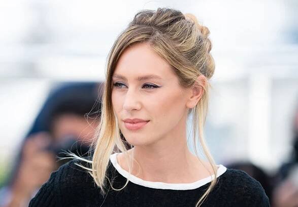 Image may contain Clothing Sleeve Apparel Human Person Dylan Penn Long Sleeve Face Hair and Home Decor