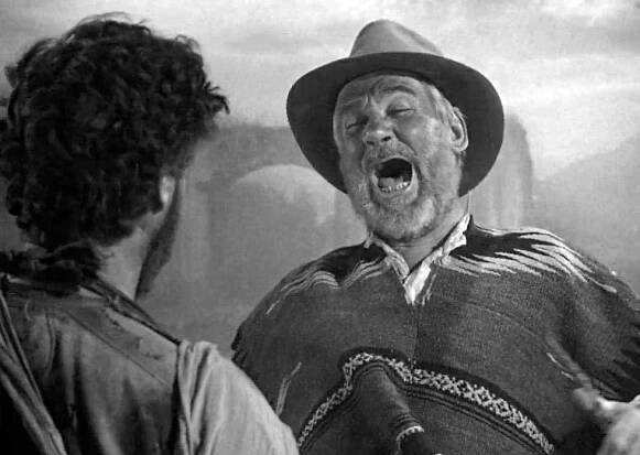 Walter Huston Academy Award Best Supporting actor winner, laughs and dances a jig when they find gold in “The Treasure of the Sierra Madre”