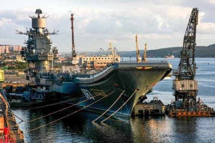 A picture taken on August 19, 2009, shows Russia's aircraft carrier Admiral Kuznetsov in Murmansk. Photo credit: VASILY MAXIMOV/AFP via Getty Images