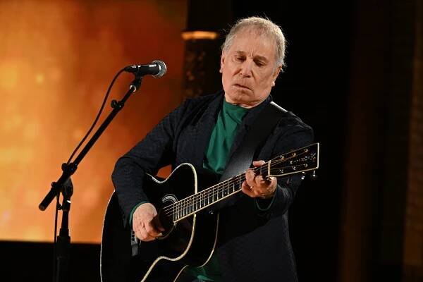 Paul Simon will play intimate theaters that benefit his hearing challenges on his new tour.. Here, Paul Simon performing.