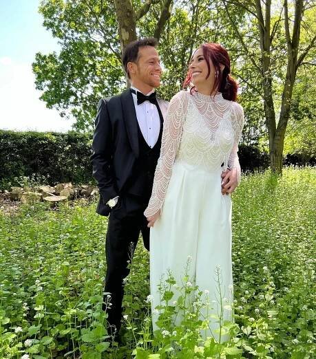 Stacey Solomon and Joe Swash in wedding attire.