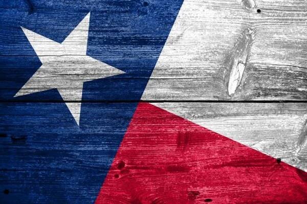 Vlajka státu Texas na staré dřevěné prkenné textury — Stock obrázek
