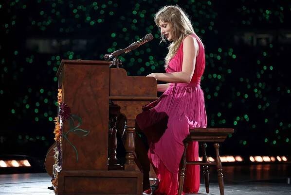 Taylor Swift performs onstage during "Taylor Swift | The Eras Tour" at Olympiastadion on July 27, 2024