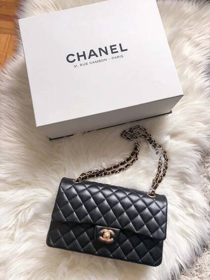 Chanel - Black Quilted Flap Bag