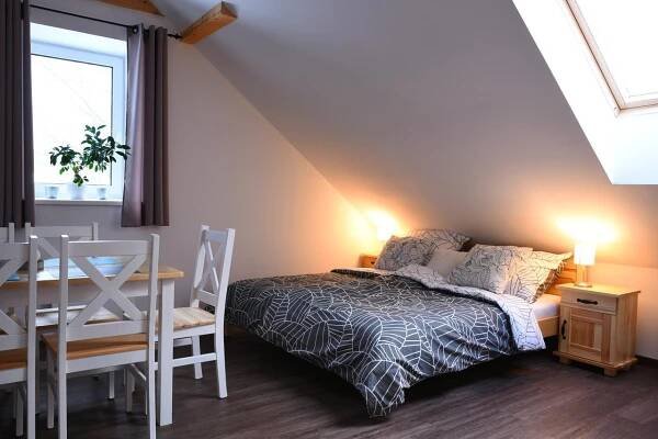 Postel nebo postele na pokoji v ubytování Apartmány Vízmberk