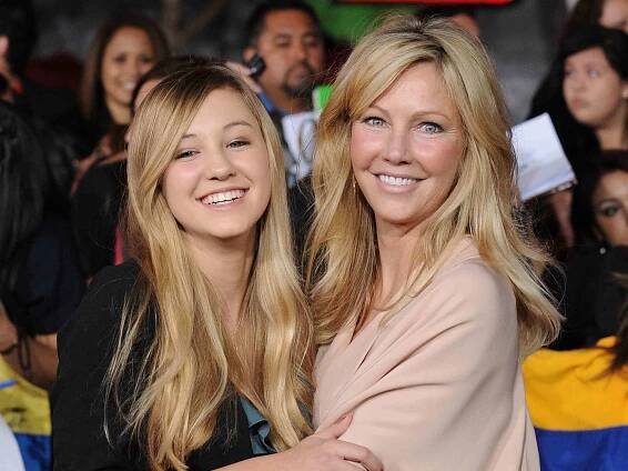Heather Locklear (R) and daughter Ava Elizabeth Sambora arrive at the Los Angeles Premiere "The Twilight Saga: Breaking Dawn - Part 1"