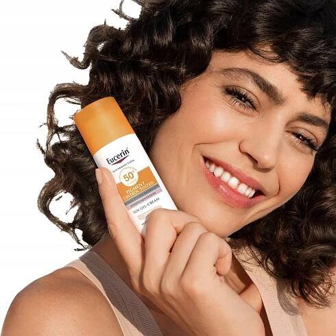 EUCERIN SUN Pleťový fluid SPF 50+ na pigmentové skvrny – světlý 50 ml Kód výrobce krem żel podkład na przebarwienia