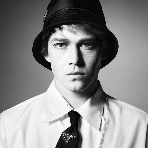Joe Alwyn & Nick Robinson Star In Prada Fall 2018 Menswear Campaign
