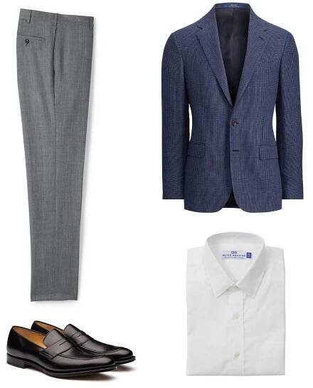 Grey men's slacks lying next to a blue blazer, white dress shirt, and loafers.