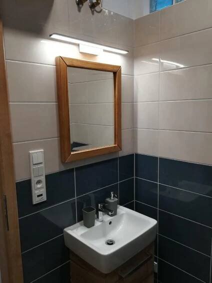 Koupelna v ubytování Apartmány U Holubů