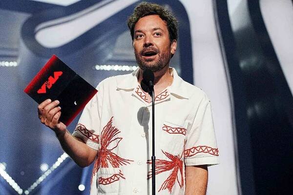 Jimmy Fallon speaks onstage at the 2022 MTV VMAs at Prudential Center on August 28, 2022 in Newark, New Jersey.