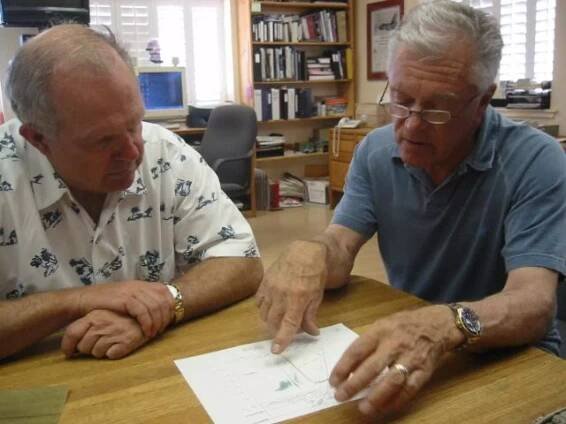 Craig Breedlove presents a performance data chart to Steve Fossett which illustrated the Spirt of America car's speed potential