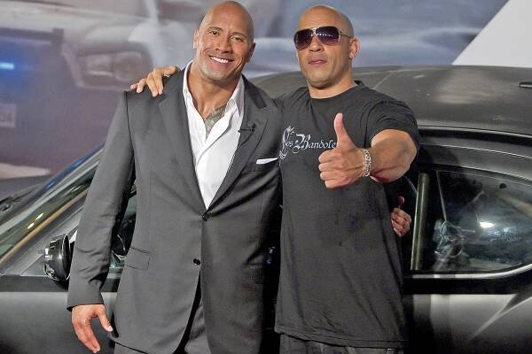 RIO DE JANEIRO, BRAZIL - APRIL 15: Dwayne Johnson (The Rock) and Vin Diesel (R) pose for photographers during the premiere of the movie "Fast and Furious 5" at Cinepolis Lagoon on April 15, 2011 in Rio de Janeiro, Brazil. (Photo by Buda Mendes/LatinContent/Getty Images)