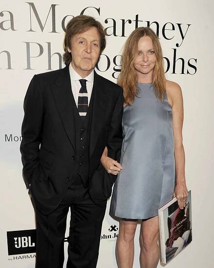 Paul McCartney and his daughter, Stella McCartney, attend a private viewing of 'A Life In Photographs: An Exhibition of Photography by Linda McCartney' at Phillips de Pury And Company on June 6, 2011 in London, England.