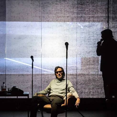 Christian Camargo and Danny Huston in The Kid Stays in the Picture directed by Simon McBurney. (Photo: Johan Persson)