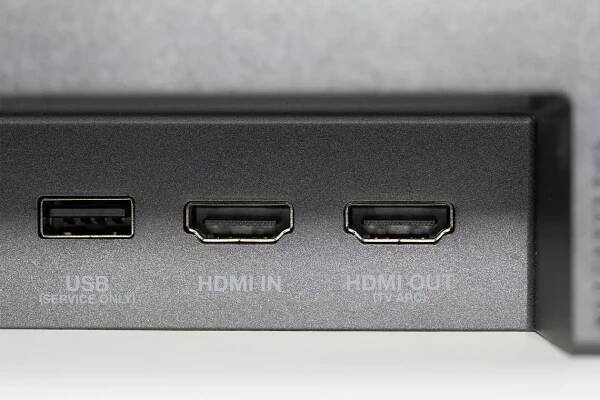 Three ports on a soundbar: a USB, an HDMI in and a HDMI out port with the label TV-ARC below it.
