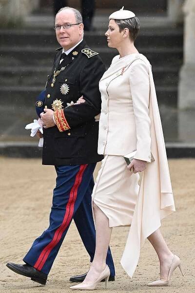 Albert II, Prince of Monaco and Charlene, Princess of Monaco attend the Coronation of King Charles III and Queen Camilla on May 06, 2023 in London, England.